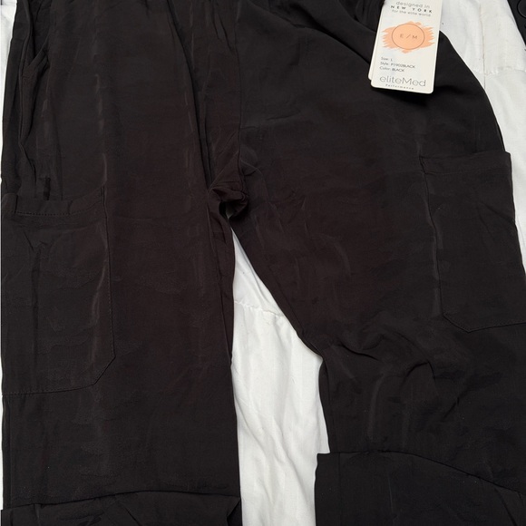 Nice nylons black material jogger style but nice enough to wear otherwise - Picture 4 of 4